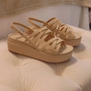 Beige Crocs Sandals